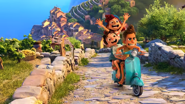 Luca, Alberto and Giulia ride a turquoise scooter down a stone road through a coastal village