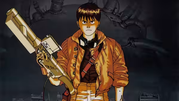Kaneda gripping a large futuristic weapon in a dark industrial area
