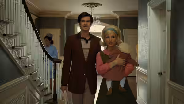 Jim Bakker (Andrew Garfield) and Tammy Faye Bakker (Jessica Chastain) carry a baby through their home