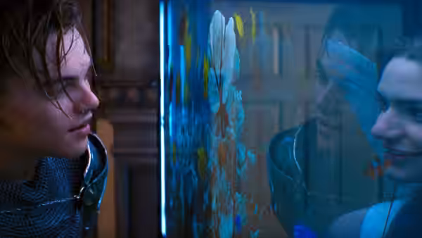 Romeo (Leonardo DiCaprio) gazing at an aquarium beside Mercutio (Harold Perrineau)