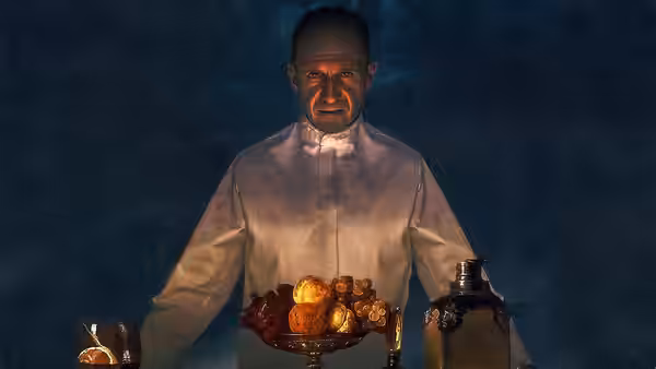 Chef Slowik (Ralph Fiennes) presents a dish at the restaurant counter
