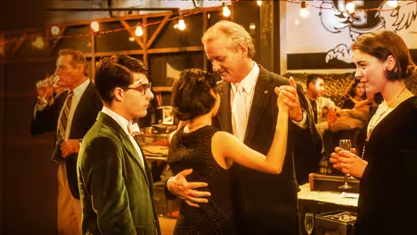 Herman Blume (Bill Murray) dancing with a woman at a party