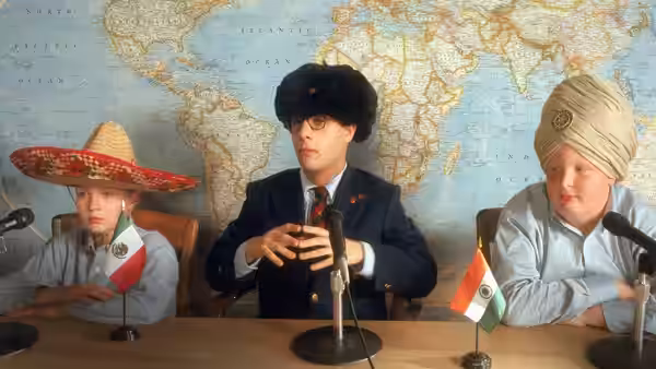 Max Fischer (Jason Schwartzman) speaking at a table with two boys