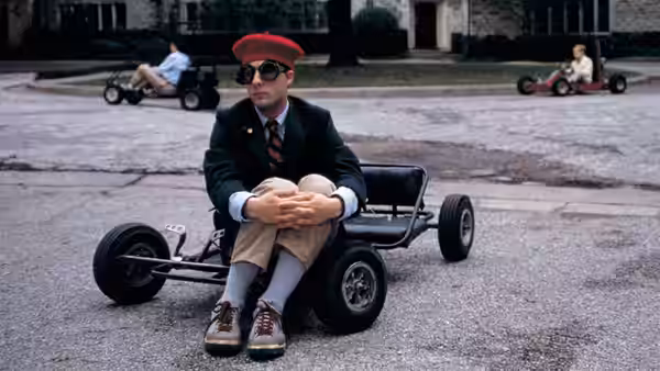Max Fischer (Jason Schwartzman) seated in a go-kart on a paved lot