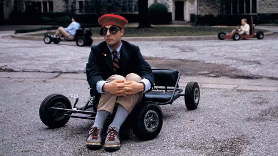 Max Fischer (Jason Schwartzman) seated in a go-kart on a paved lot