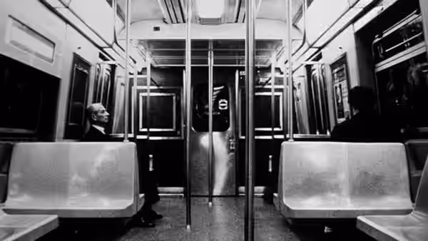 Sol Robeson (Mark Margolis) rides in an empty subway car
