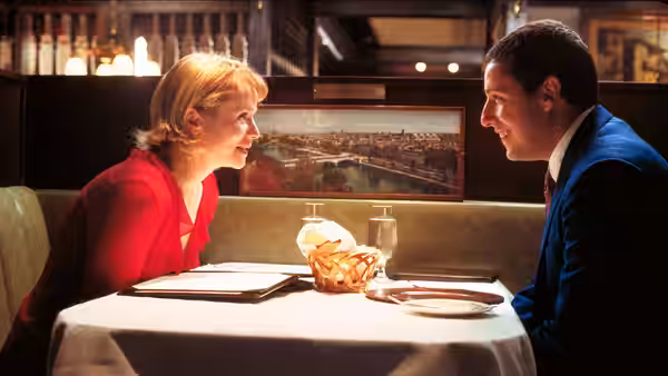 Lena Leonard (Emily Watson) and Barry Egan (Adam Sandler) at a restaurant table