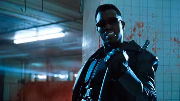Blade (Wesley Snipes) gripping a weapon in a blood-splattered tiled room