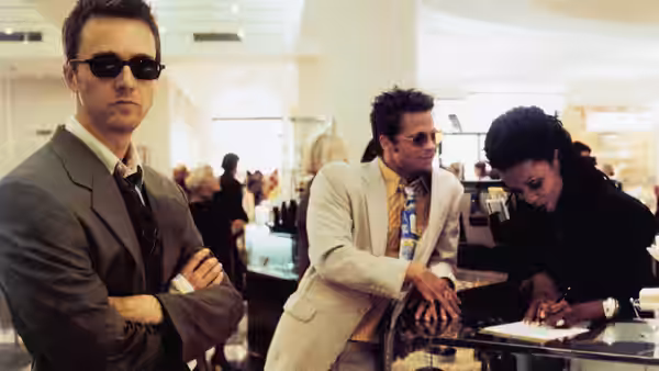 Narrator (Edward Norton) and Tyler Durden (Brad Pitt) in a department store with a woman