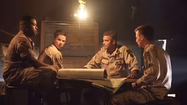 Chief Elgin (Ice Cube), Troy Barlow (Mark Wahlberg) and Archie Gates (George Clooney) study a map