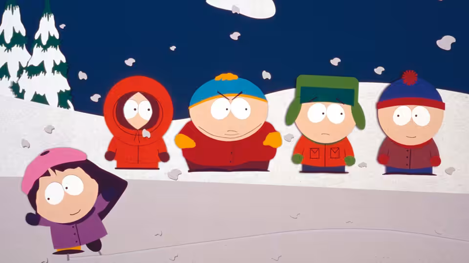 Four boys in winter coats standing with a girl on snowy ground