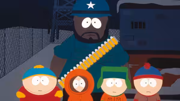 Man in uniform with bandolier standing behind four children at night