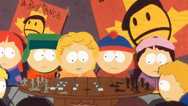 Children at a table planning with toy soldiers under resistance posters
