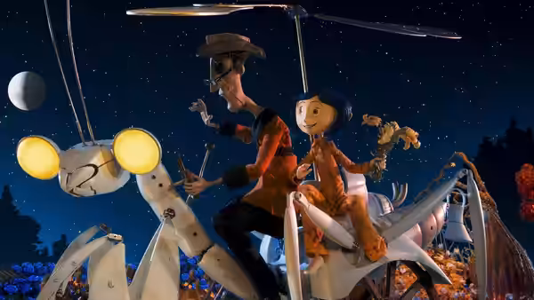 Coraline Jones (Dakota Fanning) and Other Father (John Hodgman) on a flying machine at night