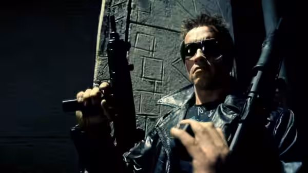Terminator (Arnold Schwarzenegger) holding assault rifles while wearing sunglasses