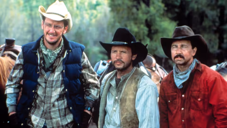Mitch Robbins, Phil Berquist and Ed Furillo standing together outdoors in cowboy hats