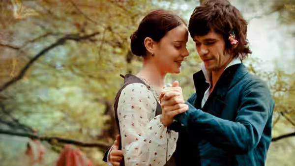 Fanny Brawne (Abbie Cornish) and John Keats (Ben Whishaw) dance beneath autumn trees
