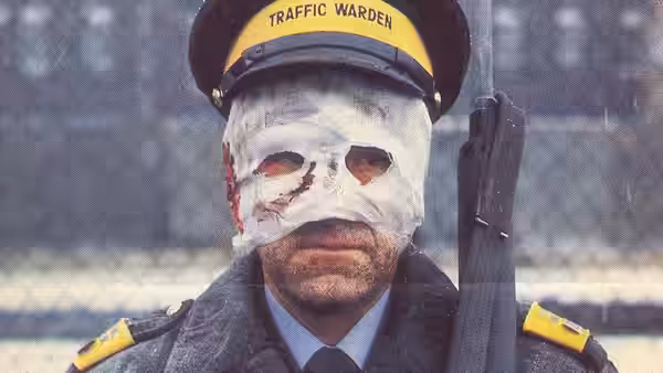 A traffic warden wearing a white mask and holding a rifle in falling snow