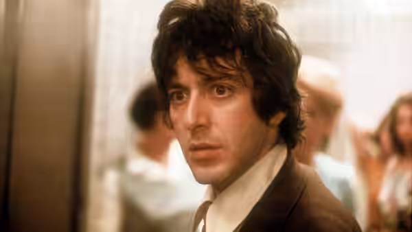 Close view of Sonny (Al Pacino) with a serious look on his face