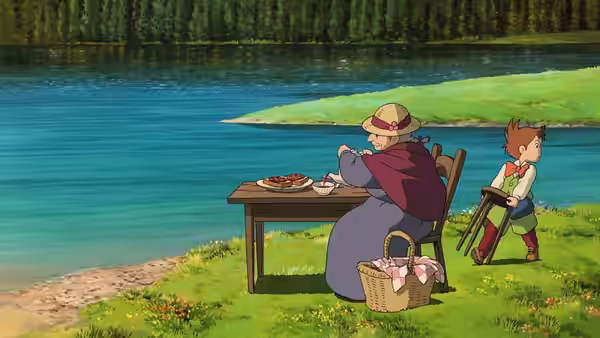Sophie (Chieko Baishō) and Markl (Ryunosuke Kamiki) picnicking by a lakeside table