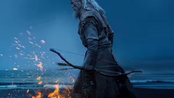 Robin Hood (Hugh Jackman) holding a bow by the sea at night