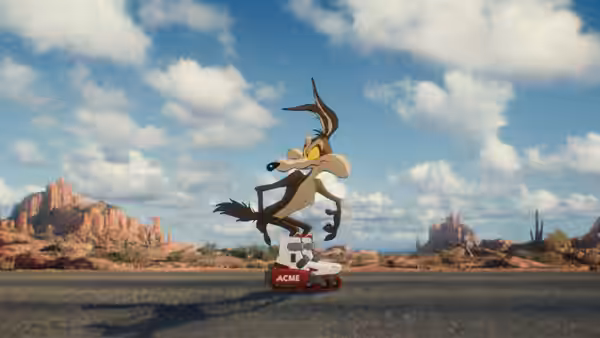 Wile E. Coyote balancing on roller skates atop an ACME box in the desert
