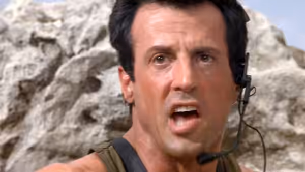 Gabe Walker (Sylvester Stallone) shouting into a radio headset