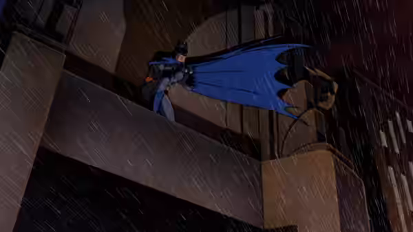 Batman perches on a rainy building ledge with cape spread