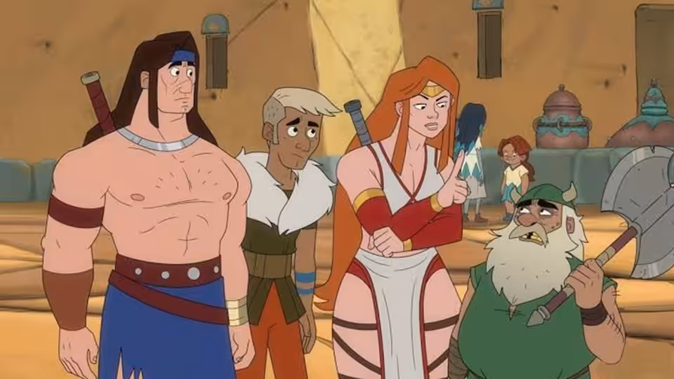 Tyris Flare (Lisa Gilroy) and Gilius Thunderhead (Matthew Rhys) stand with companions inside a castle hall