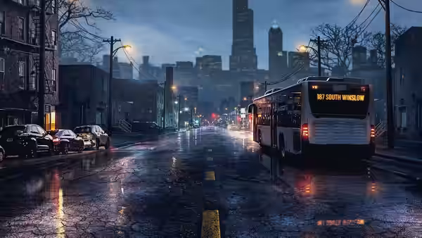 A city bus driving on a wet street at night toward distant skyscrapers