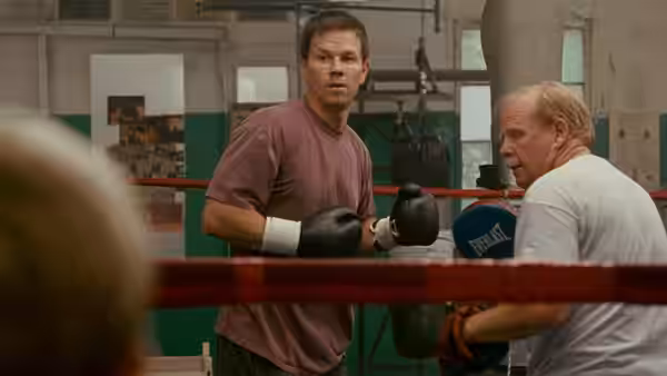 Micky Ward (Mark Wahlberg) faces his coach inside a boxing ring
