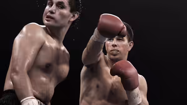 Two shirtless boxers trade punches during a sparring session in darkness