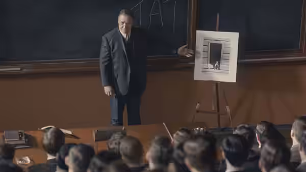 Henry Murray (Russell Crowe) addresses a classroom beside a displayed document