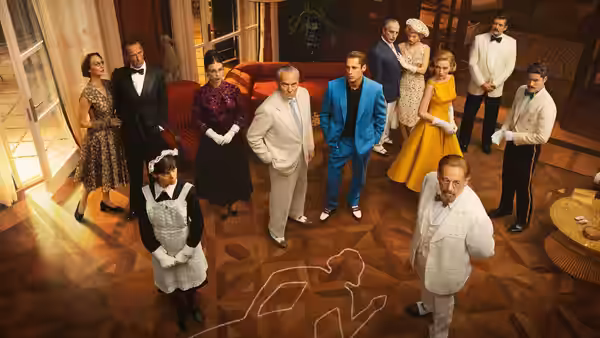 A group gathers around a chalk outline on the floor of a wood-paneled room