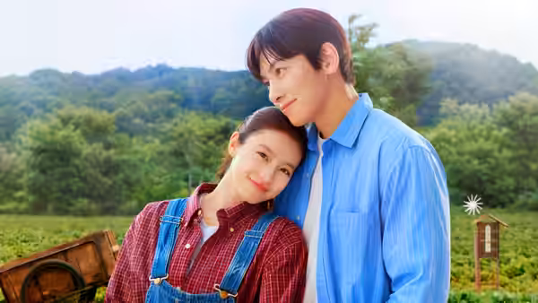 Shirahama Karin (Mio Imada) leans against Lee Yu-bin (Ji Chang-wook) outdoors amid green hills