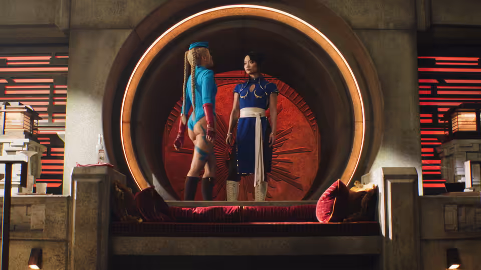 Cammy and Chun-Li facing each other on a raised red circular platform