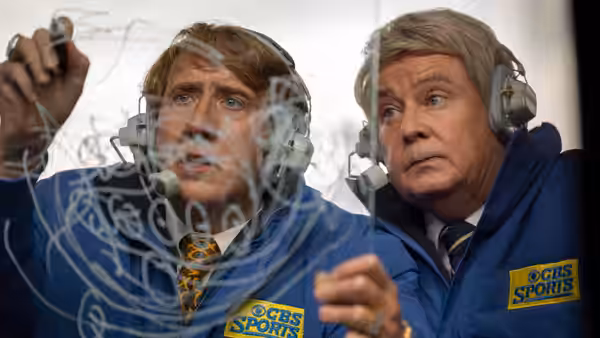 John Madden (Nicolas Cage) and a co-commentator review a telestrator drawing