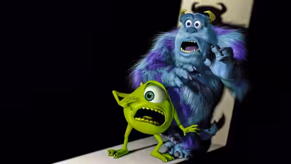 Mike and Sullivan cling to a door frame looking frightened