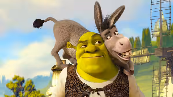 Shrek carrying Donkey on his shoulders in a grassy field