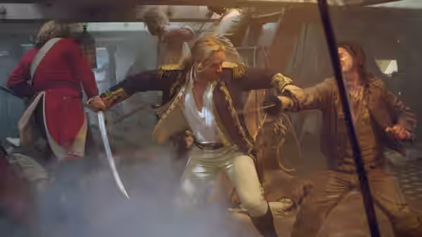 Captain Jack Aubrey (Russell Crowe) fighting with a sword on the ship's deck