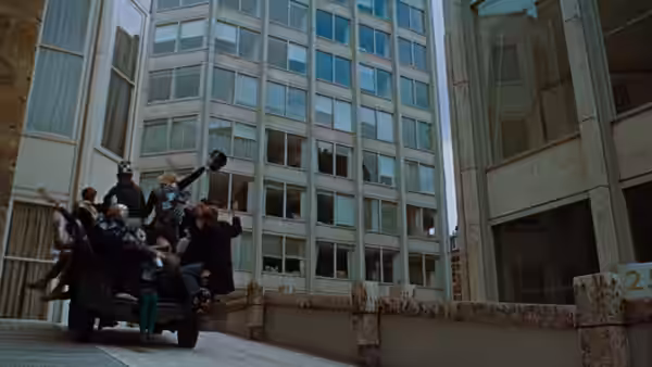 Mimes play imaginary tennis on a London terrace between office buildings
