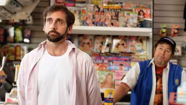 Frank Ginsberg and Edwin Hoover standing in a convenience store