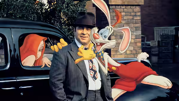 Eddie Valiant (Bob Hoskins) by a car with Roger and Jessica Rabbit