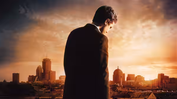 Patrick Kenzie (Casey Affleck) overlooking the city from a high vantage point at sunset