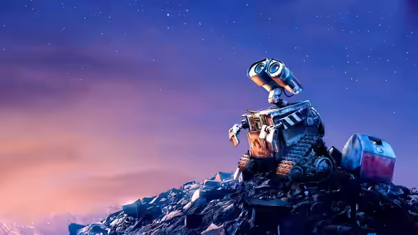 WALL·E stands atop a heap of rubbish beneath a starry sky