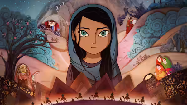 Parvana (Saara Chaudry) with long dark hair faces forward amid a fantastical mountainous landscape and distant caravan