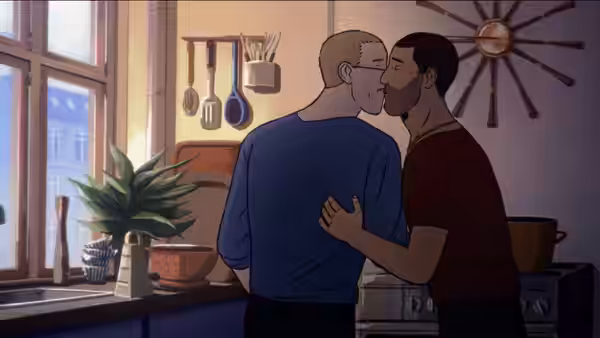 Two men kiss and embrace while standing in a kitchen