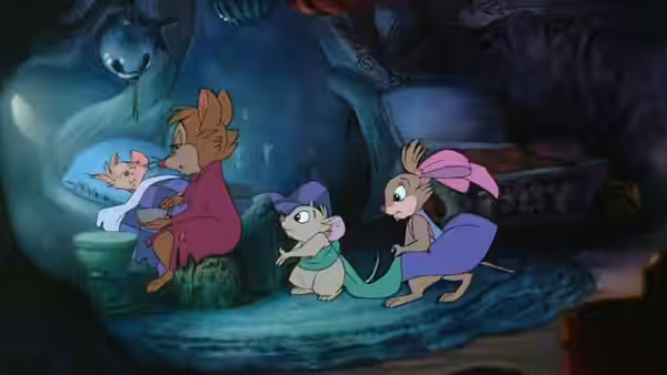 Mrs. Brisby (Elizabeth Hartman) holds her baby while two children watch nearby