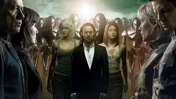 Gaius Baltar (James Callis) stands with allies before rows of Cylons