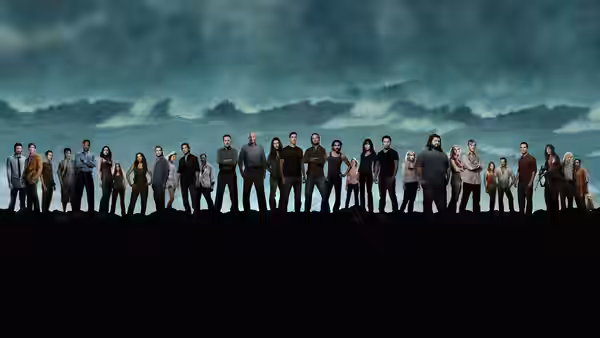 Large group standing on a dark cliff edge against a turbulent ocean at dusk